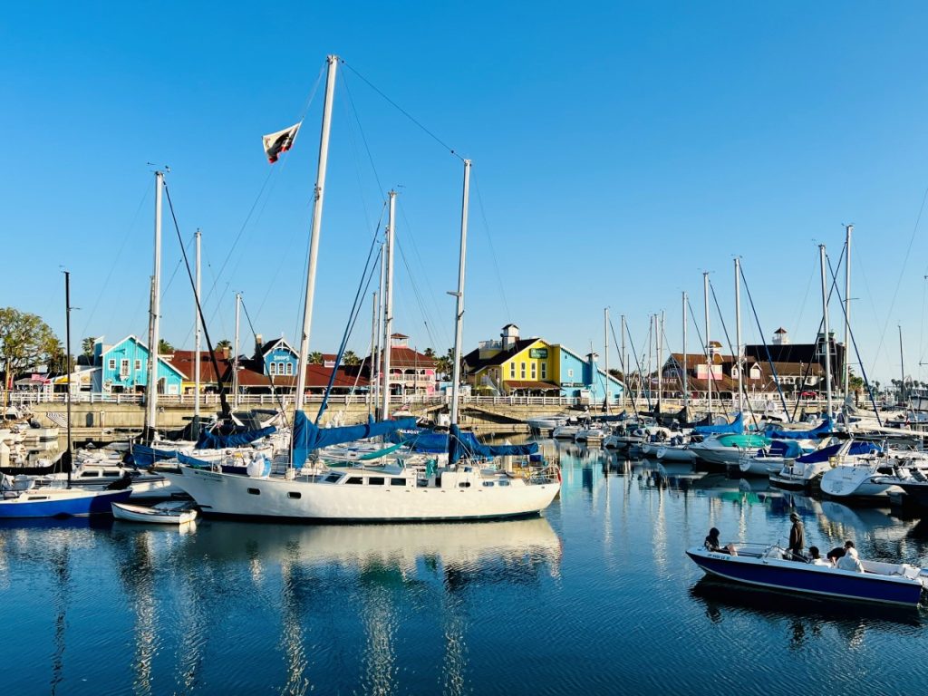 boat in harbor of shoreline village - 