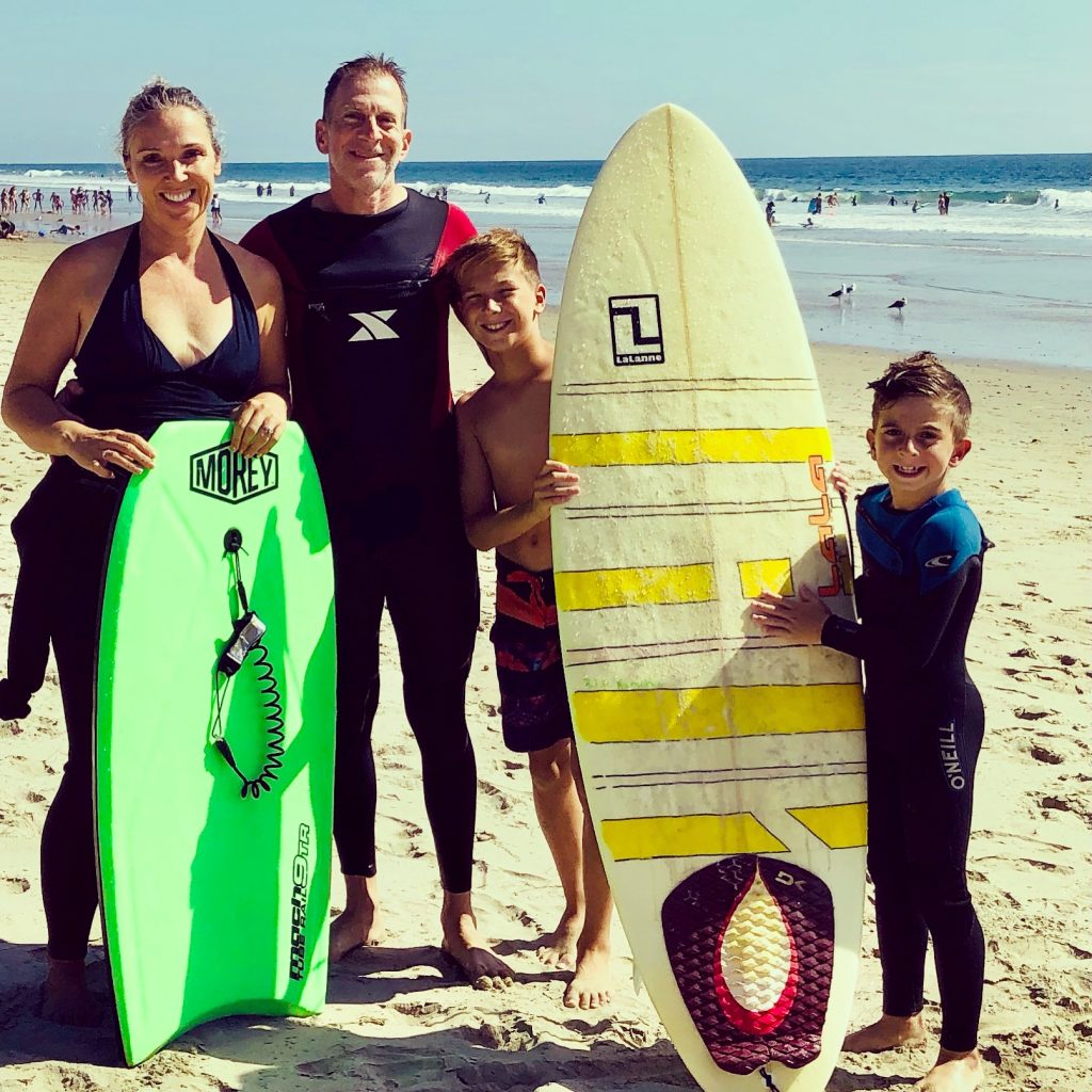 family of four on beach - best california beaches for families