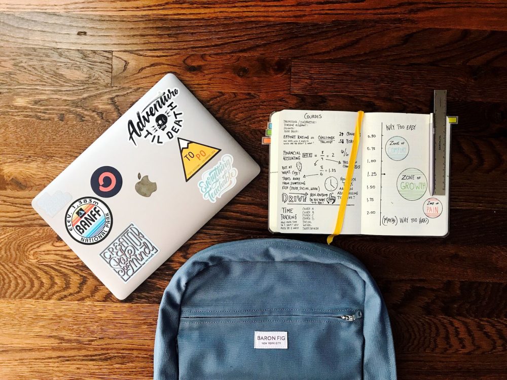 backpack, laptop and book