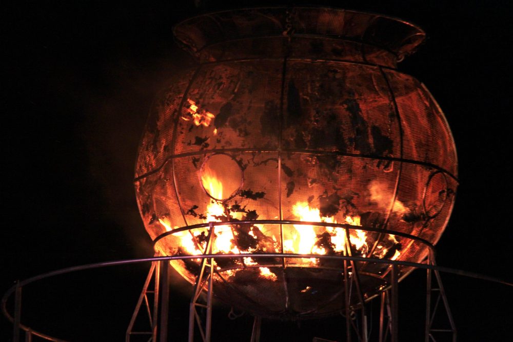 Burning urn filled with treasured momentos of loved ones.