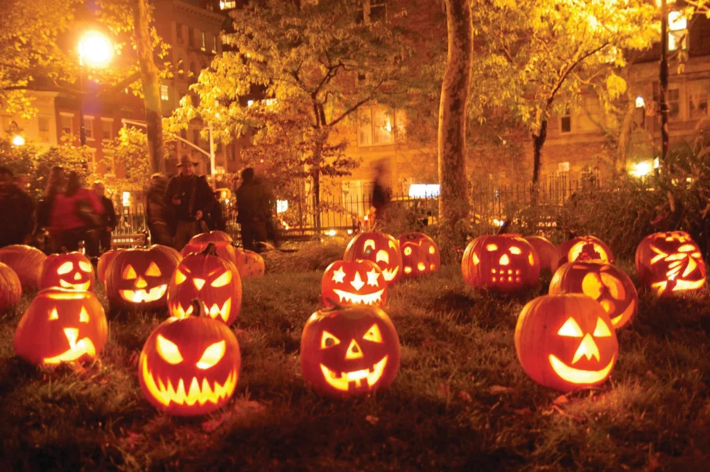 carved pumpkins in foggy park