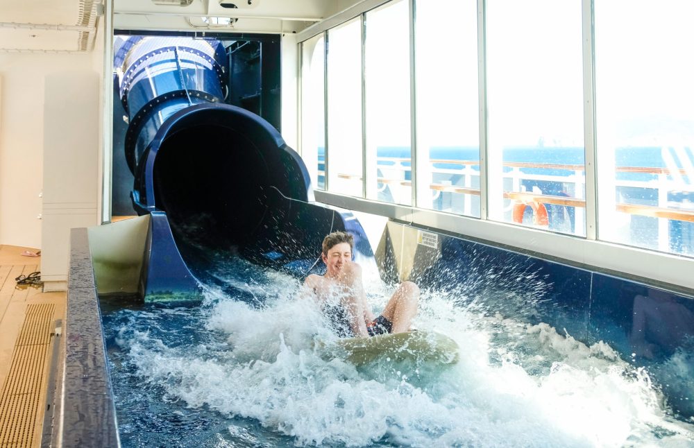 Boy playing at waterpark on ship - best cruises for teens
