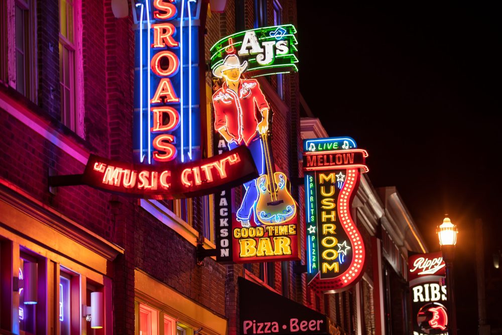 Night scene of Honky Tonks in Nashville, TN. - Vacation Spots for Teens in the U.S.