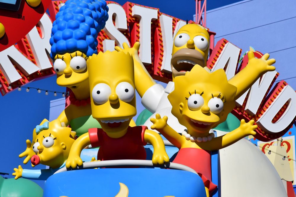 Simpson family riding roller coaster - Vacation Spots for Teens in the U.S.