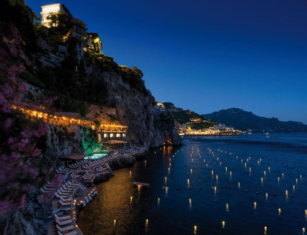 The beautiful Hotel Santa Caterina on the Amalfi Coast in the evening aglow with candle light.