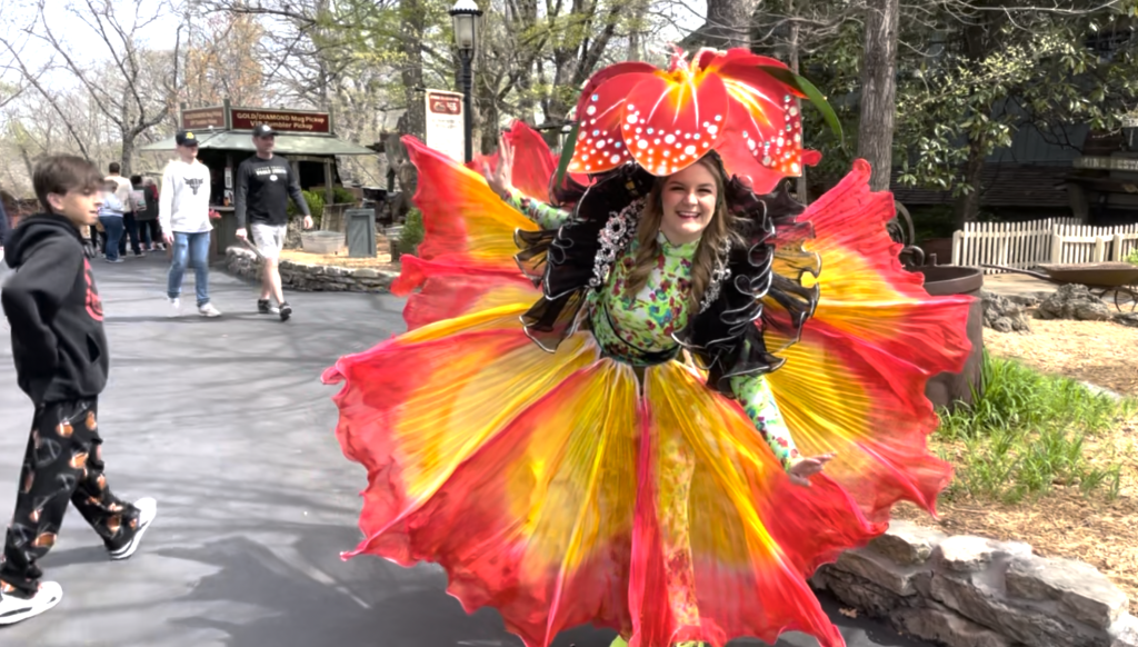 woman in a flower dress and hat - Branson Family Vacations