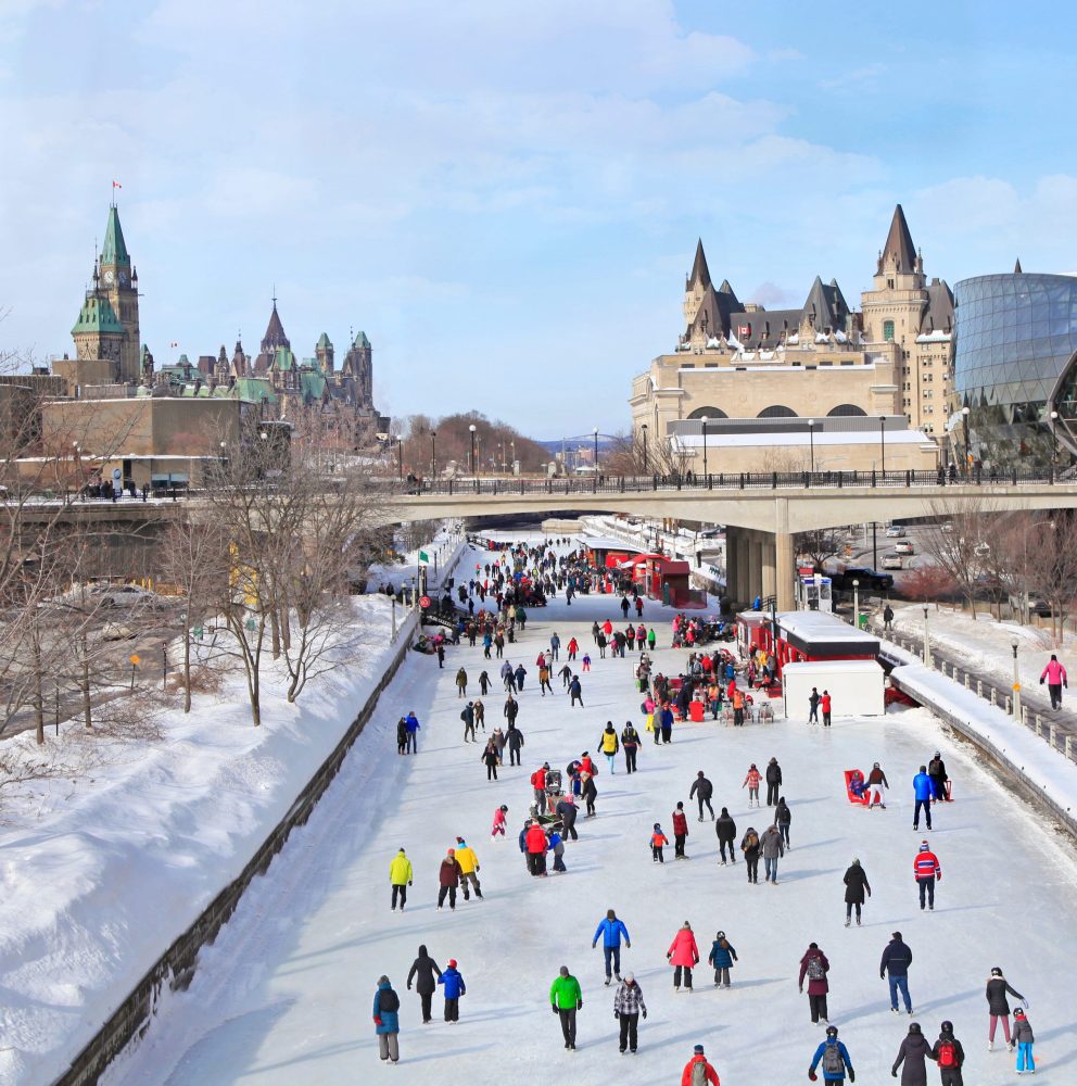 skaters gliding down Rideau Canal