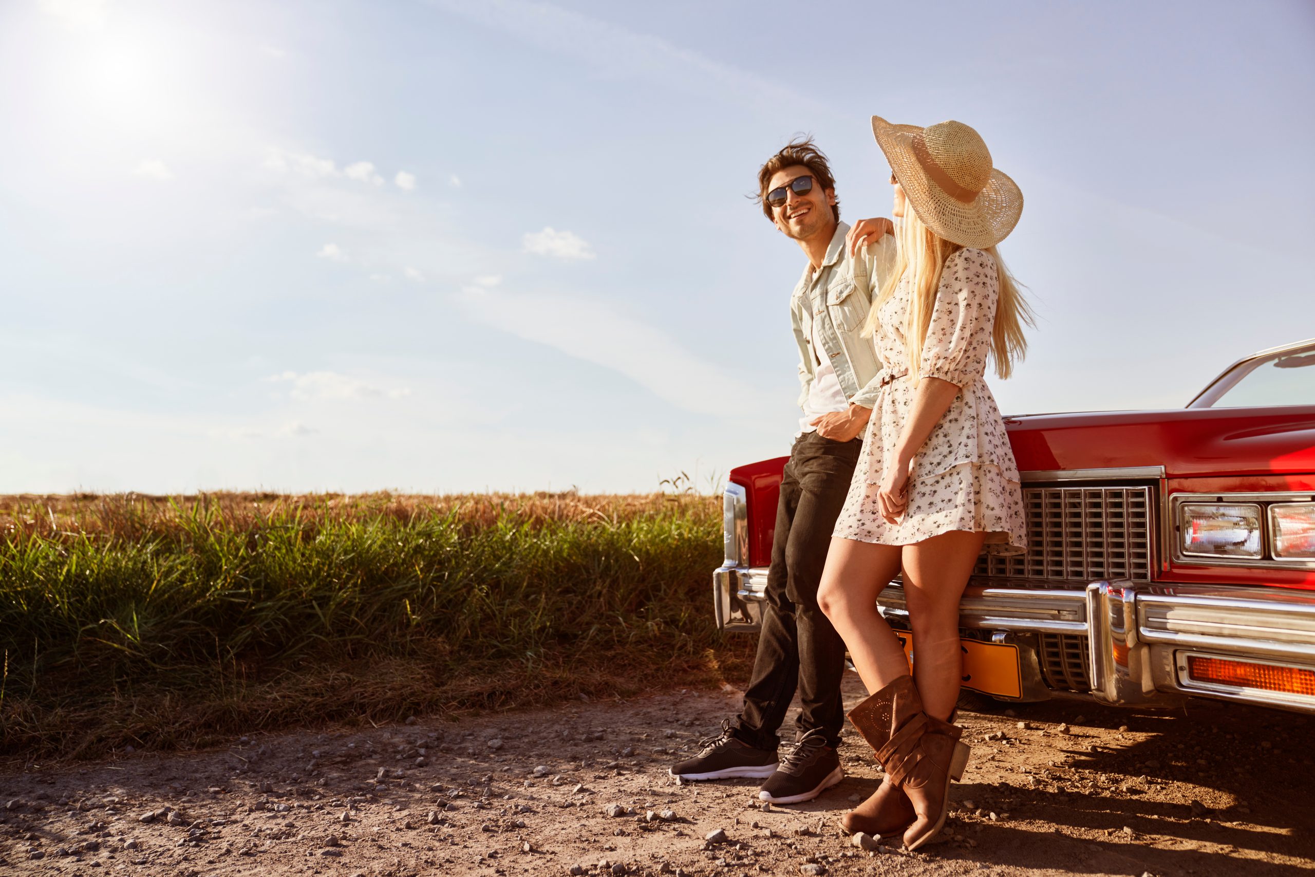 Couple leaning on car -Romantic Getaways near LA