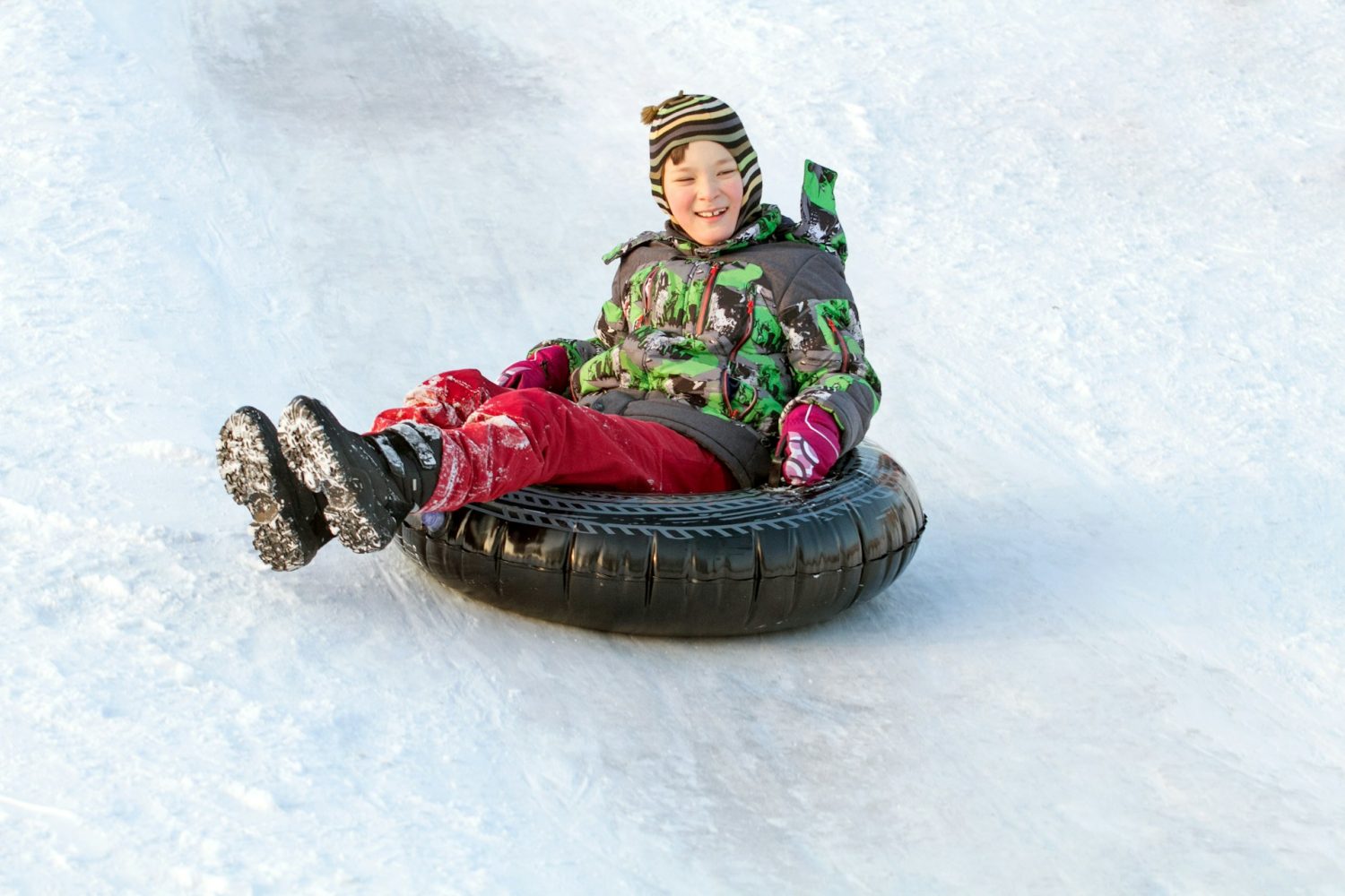 Snow tubing at Woodloch Resort. All-inclusive resorts kids stay free.