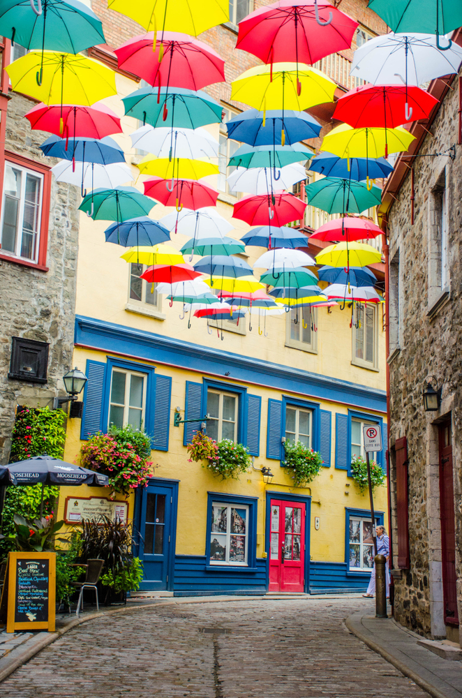 In the spring, the street name Petit Champlain, gets dressed up with colorful umbrellas. -Petit Champlain -Quebec