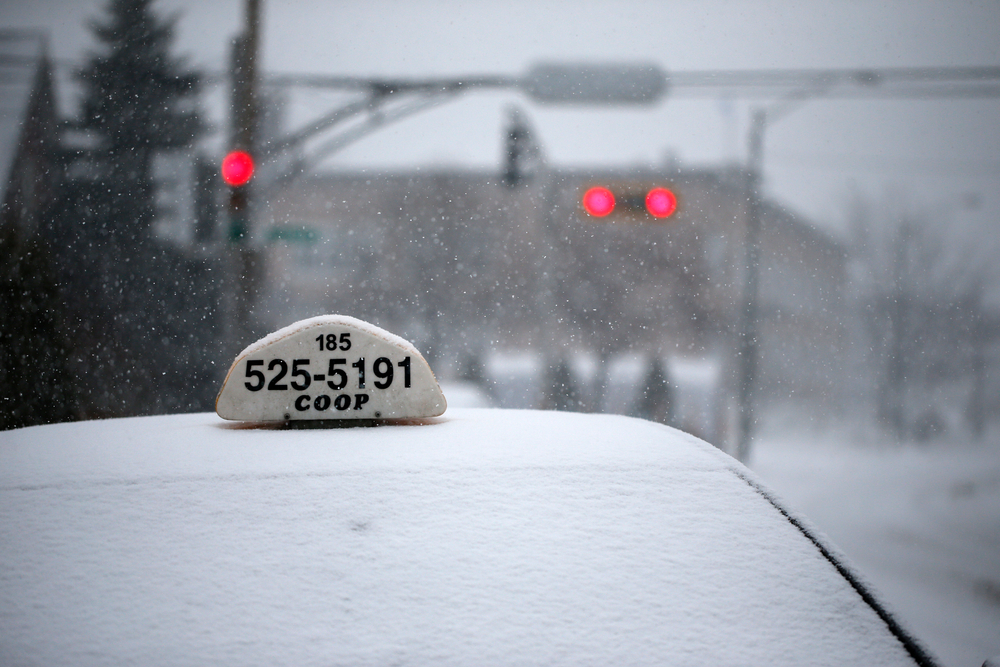 snowy taxi scene -quebec city hotel