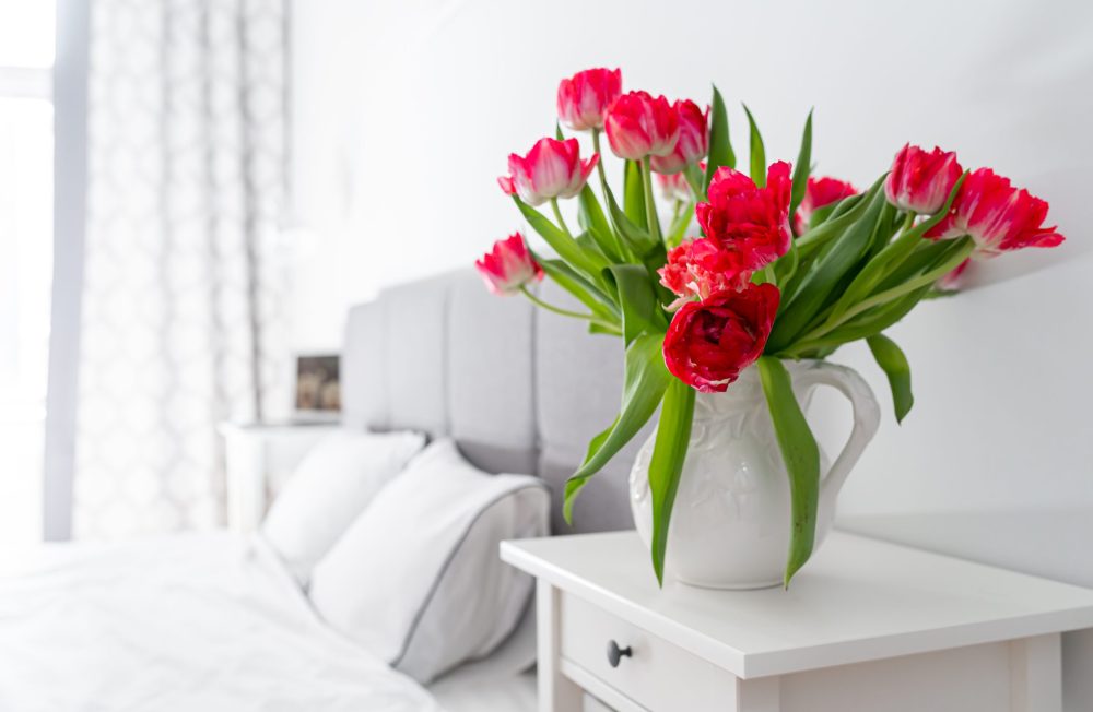 Tulips in a bedroom