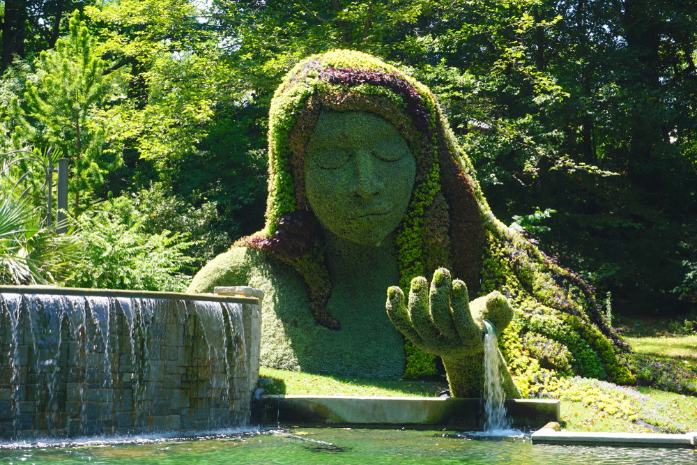 The focal point of the Cascades Garden, this 25-foot sculpture is named "Earth Goddess."