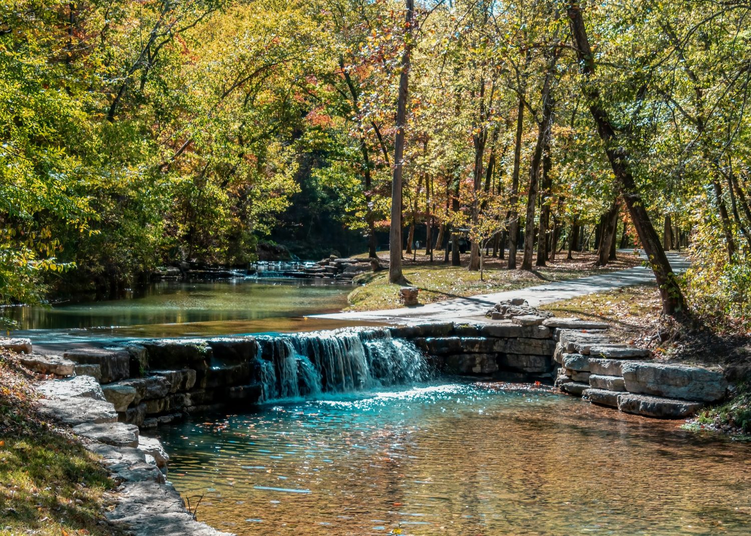 Beautiful creek and small waterfall in Dogwood Canyon. Best Father's Day Trips.