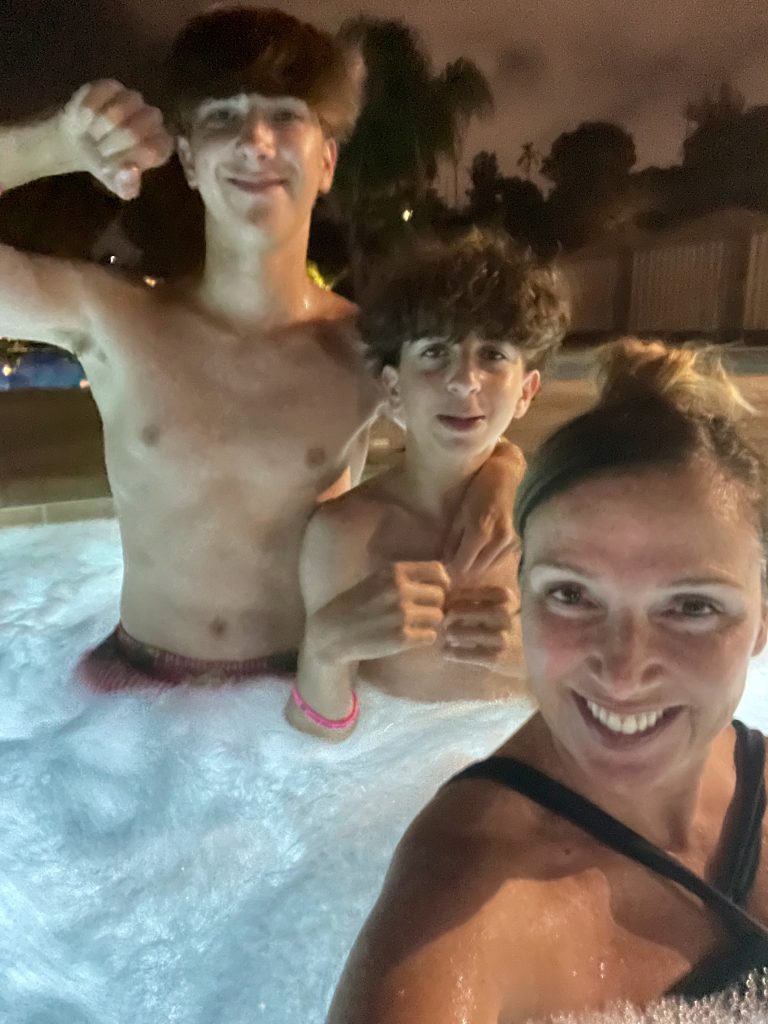 boys in hot tub with mom