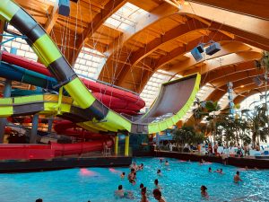 Photo by Toa Heftiba on Unsplash. Hotels with indoor waterparks.