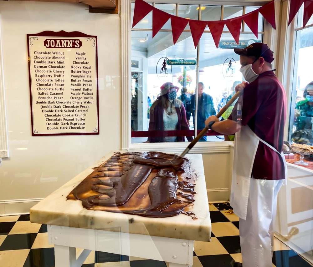 man making a huge slab of fudge