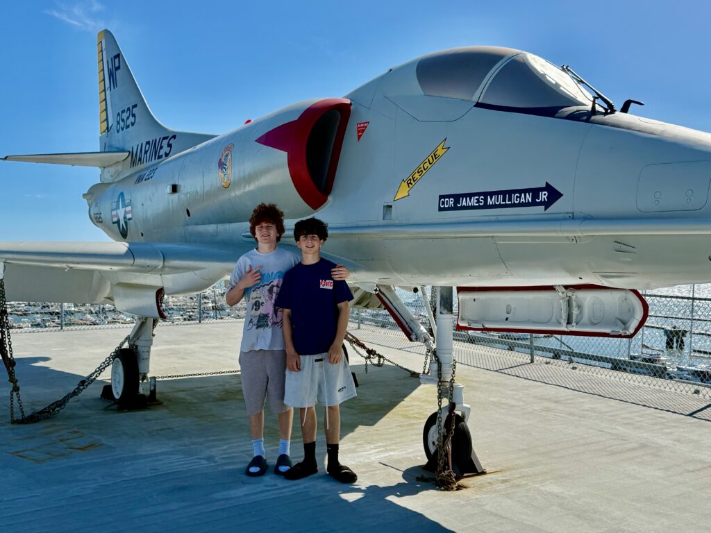 two buys under fighter plane