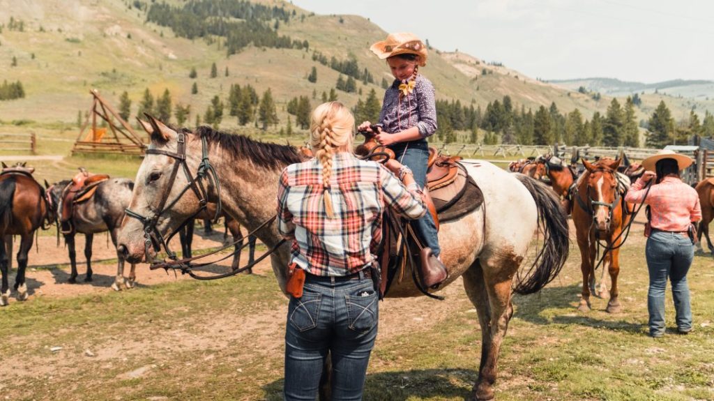 young girl on horseback.
