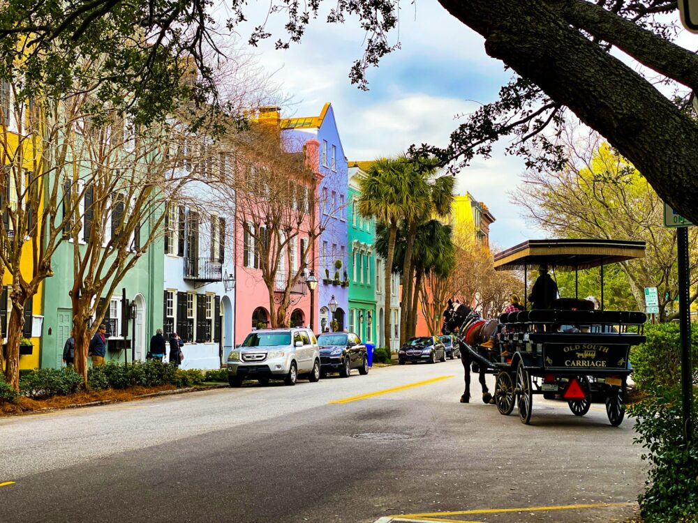 horse drawn carriage by rainbow row in charleston