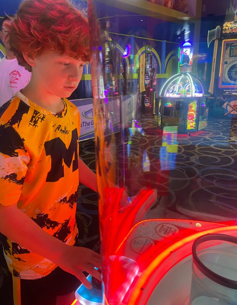Playing at Max Arcade at Icon Park