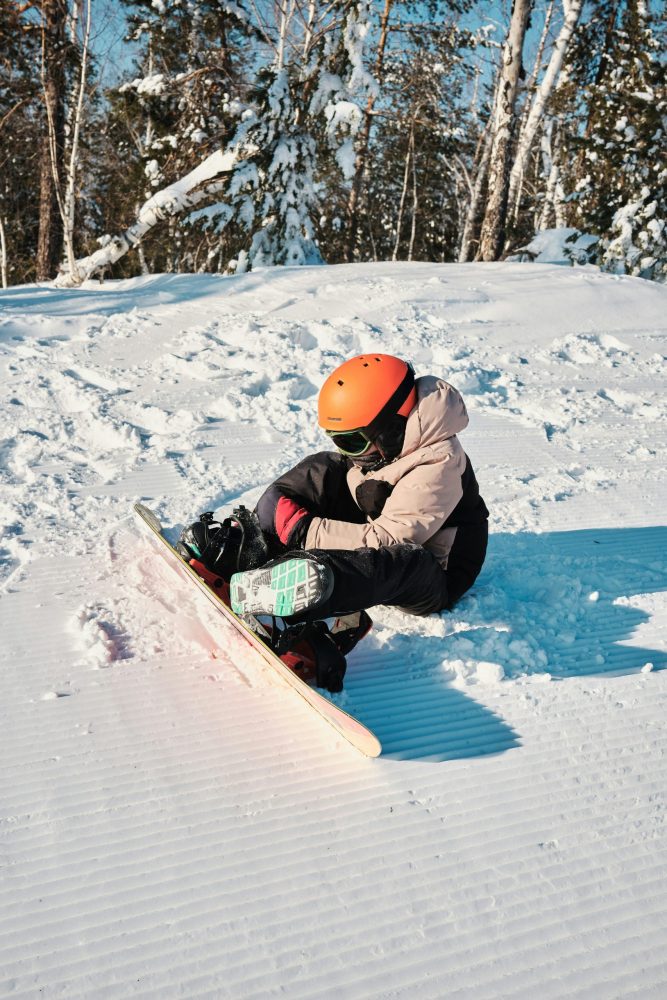 boy learning to snow board
