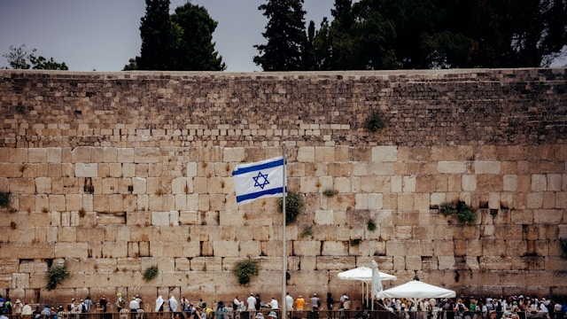 israeli flag in front of western wall