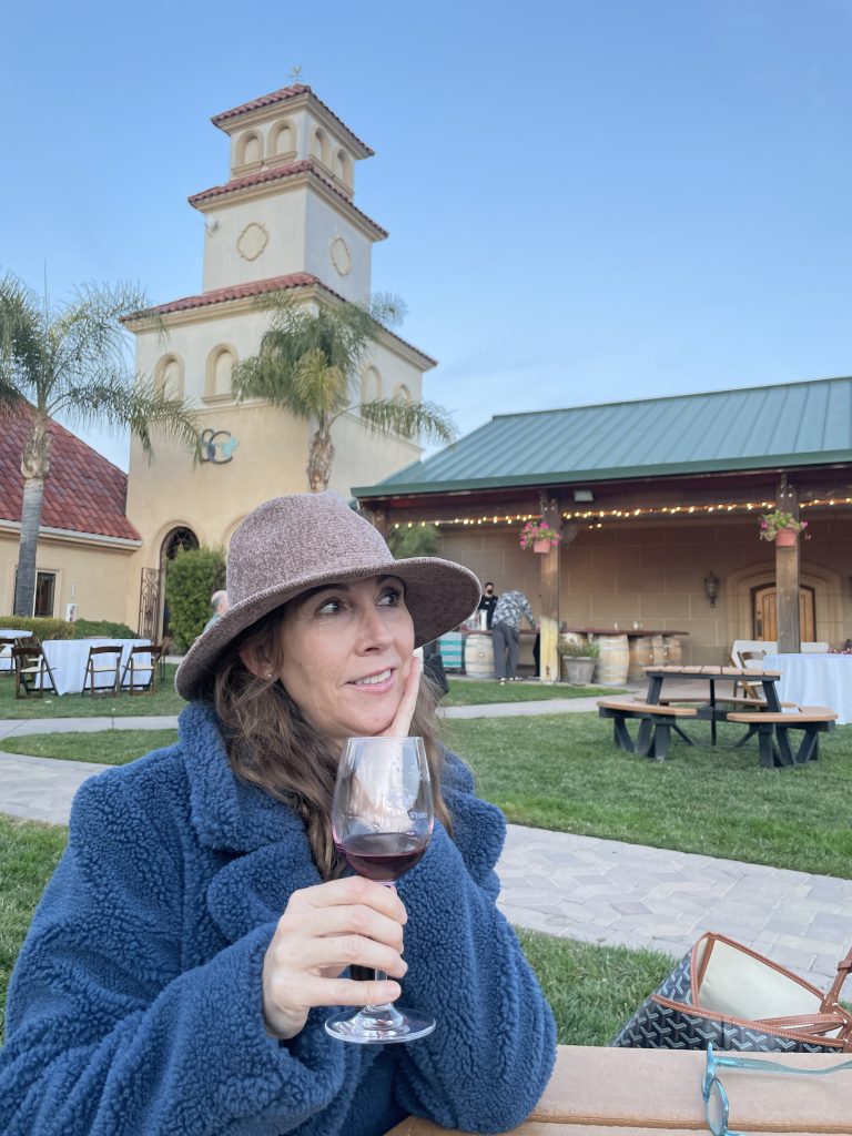 woman sipping wine at south coast winey in Temecula Valley