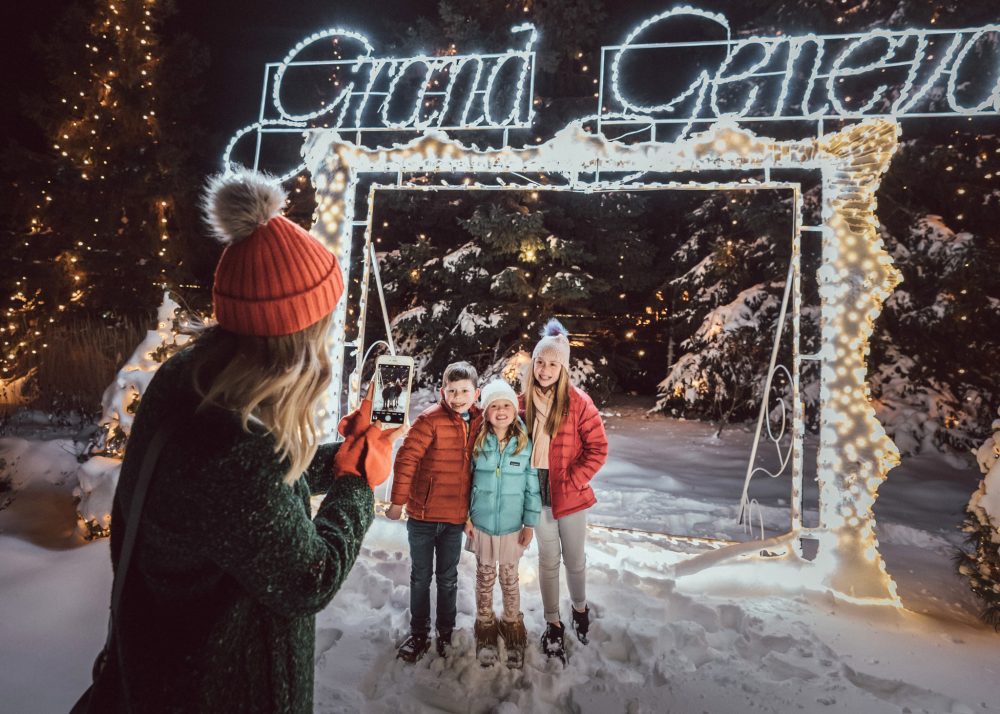 Grand Geneva Christmas Trolley stop where mom and children pose for picture