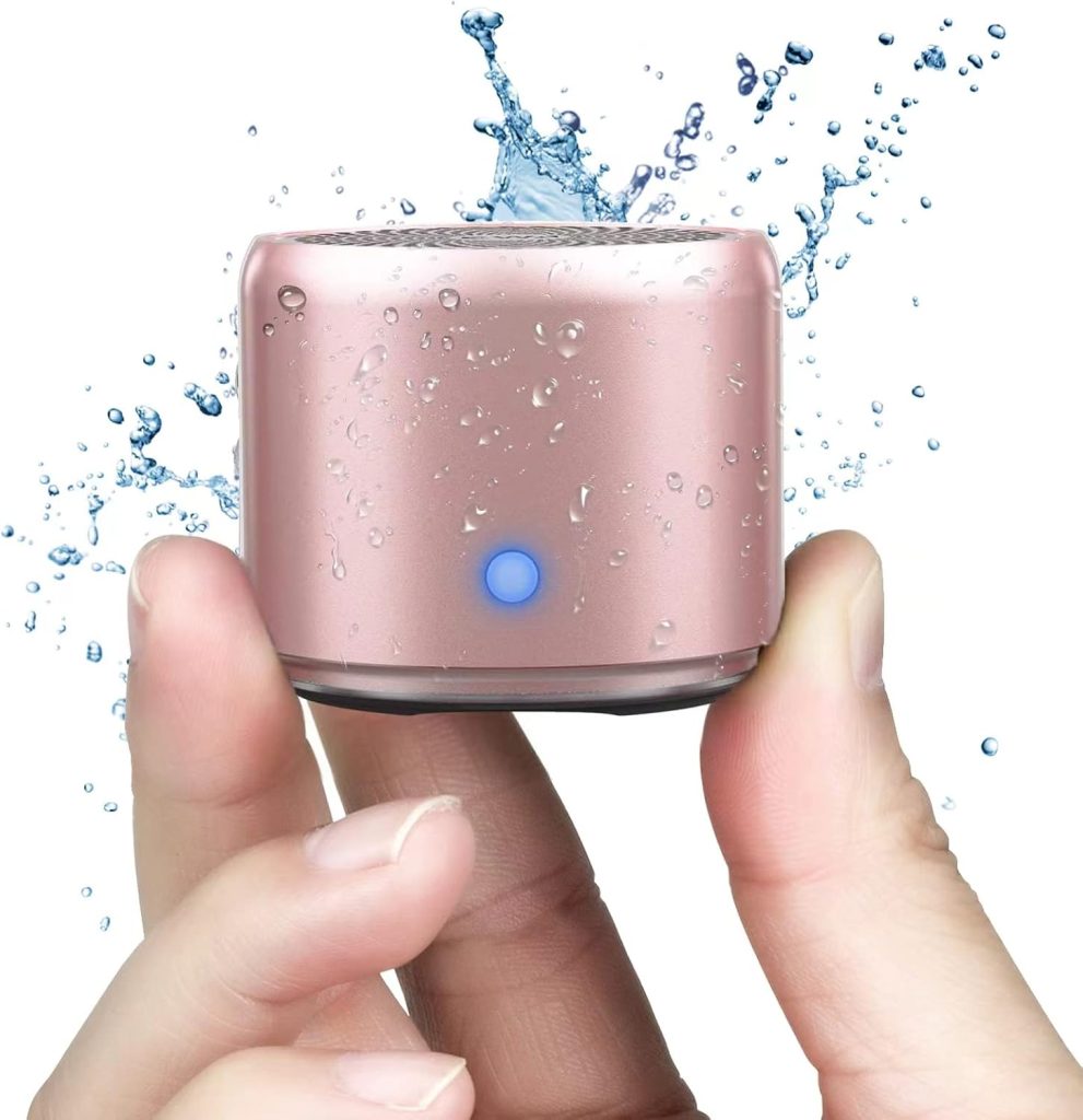 pink cylinder shaped speaker