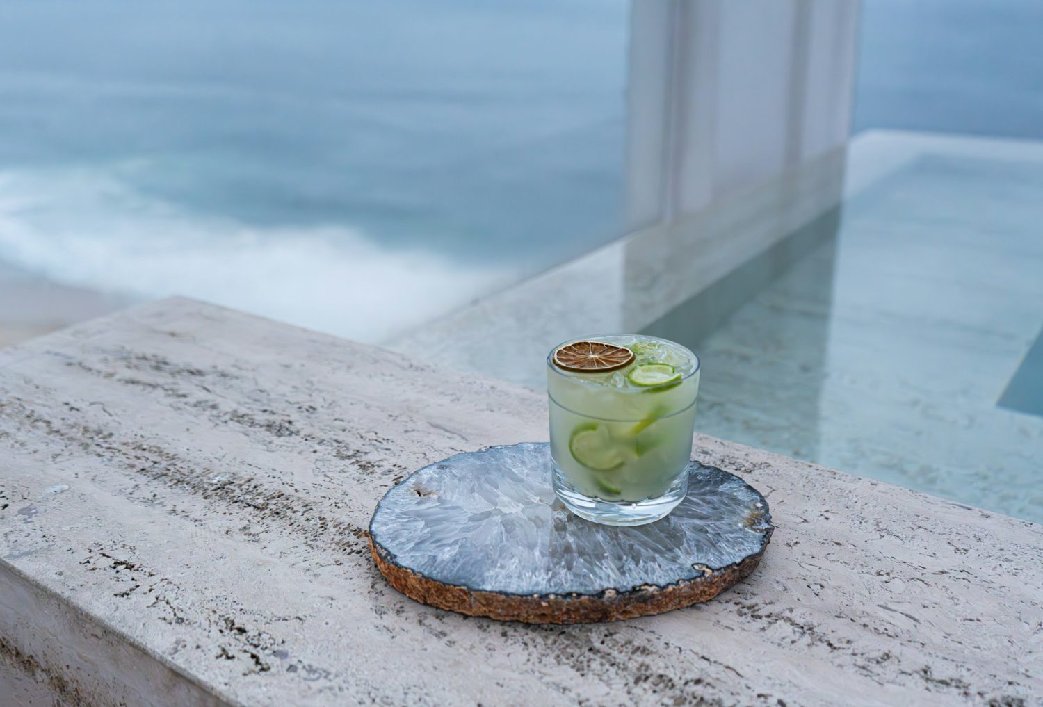 Cocktail sitting by the side of a pool. US Virgin Islands family resorts. 