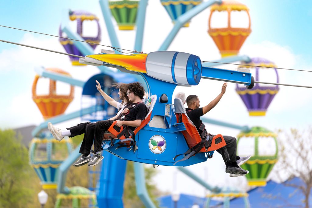 Kids on zipline ride at Morgan's Wonderland.