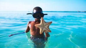 boy with sea star