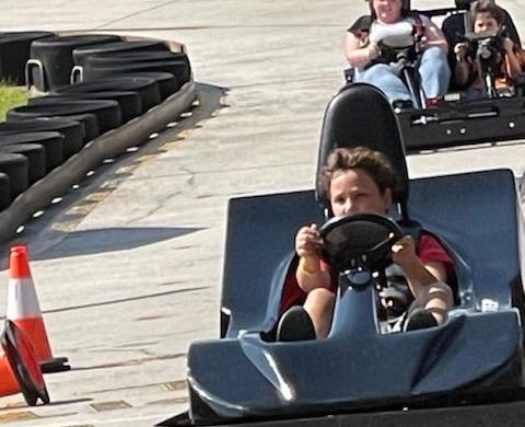 Family riding go-karts. Things to do in Poconos PA with kids. 