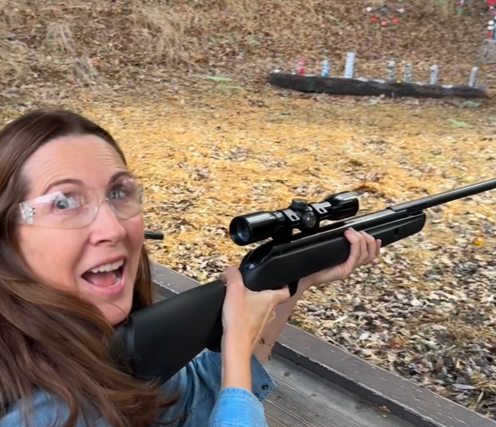 surprised mom with rifle