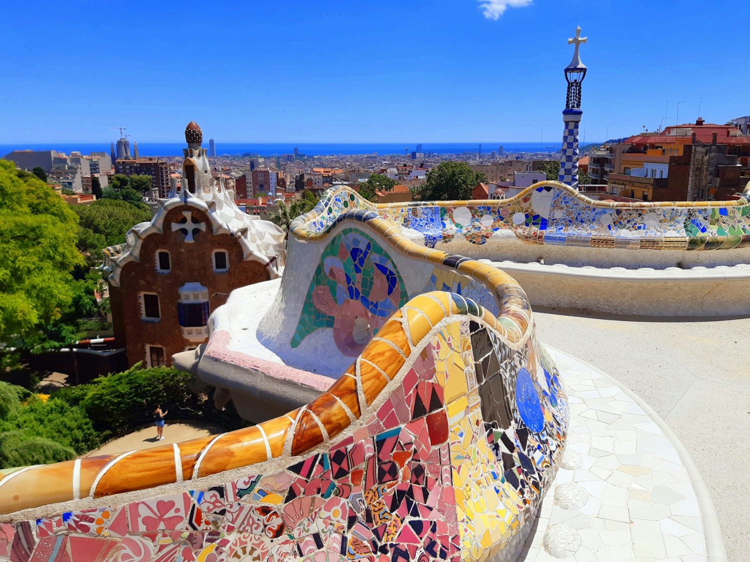 Gaudi's colorful mosaics at Park Guell in Barcelona. Best places to visit in May in Europe.