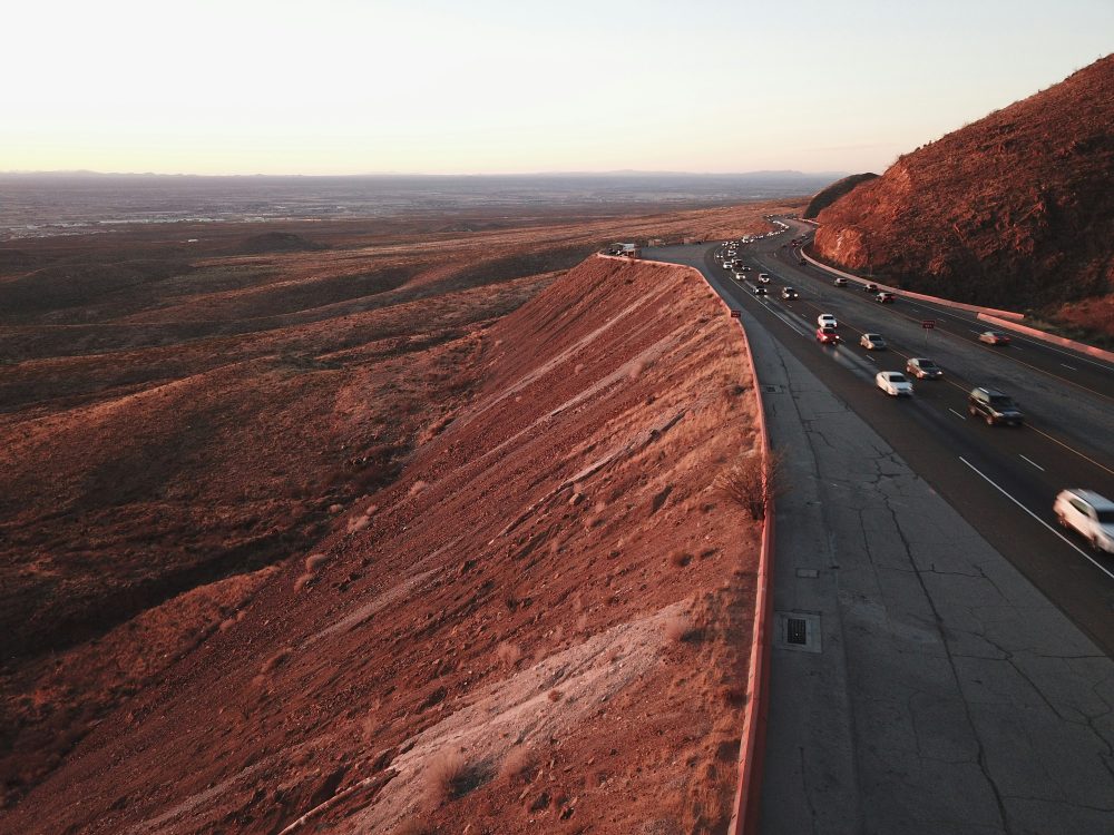 Busy road cutting through mountains in El Paso