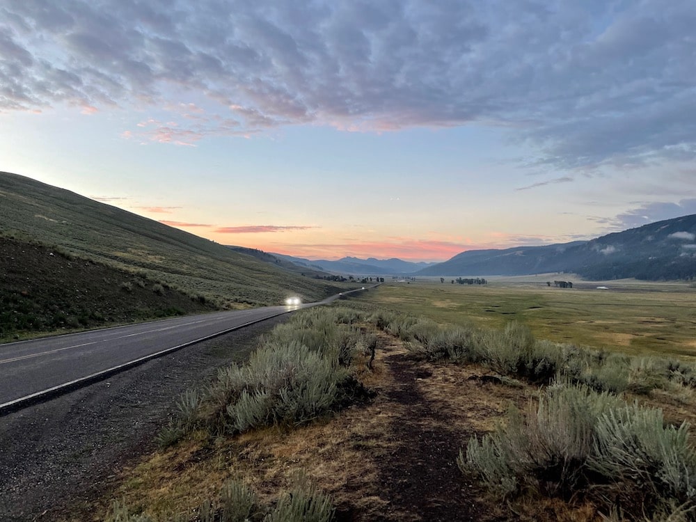 breaking dawn by side of road in Yellowstone