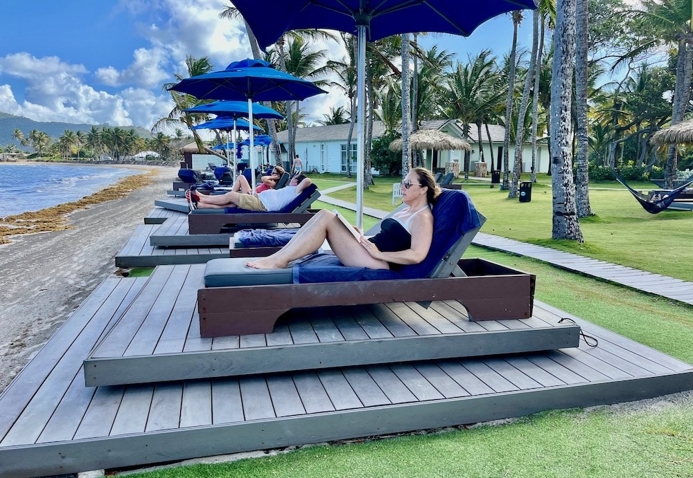 woman sitting on sunlounger