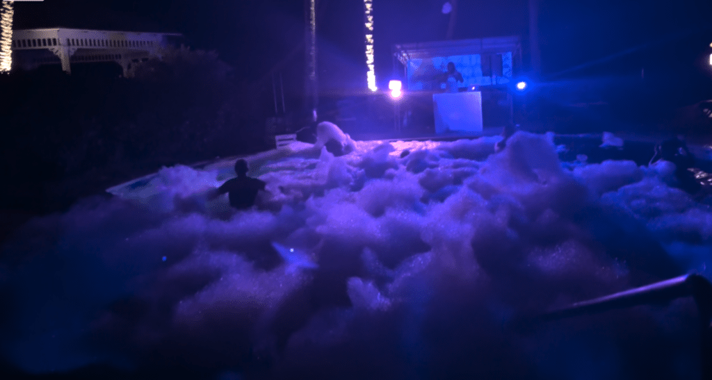 foam in pool at night