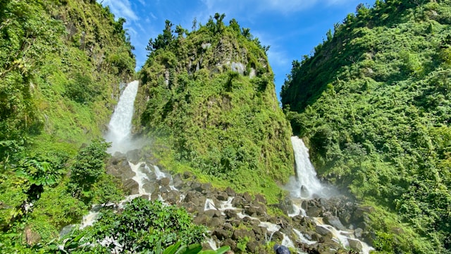 waterfall on green clifffs