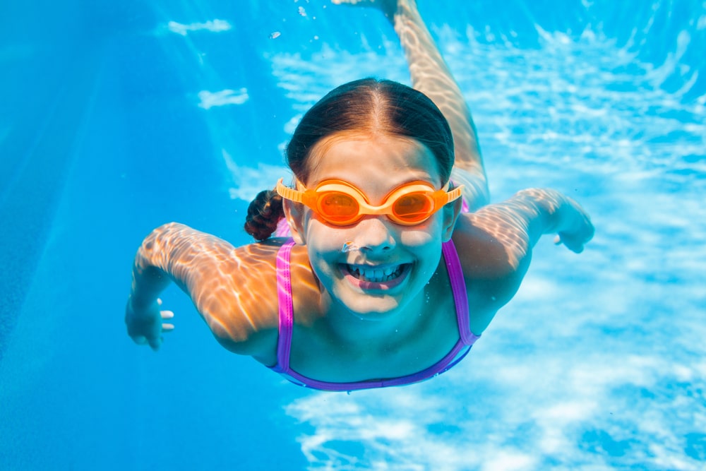 girl swimming in pool
