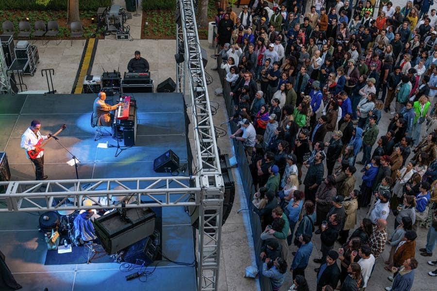 aerial view of crowd around musicians on stage 