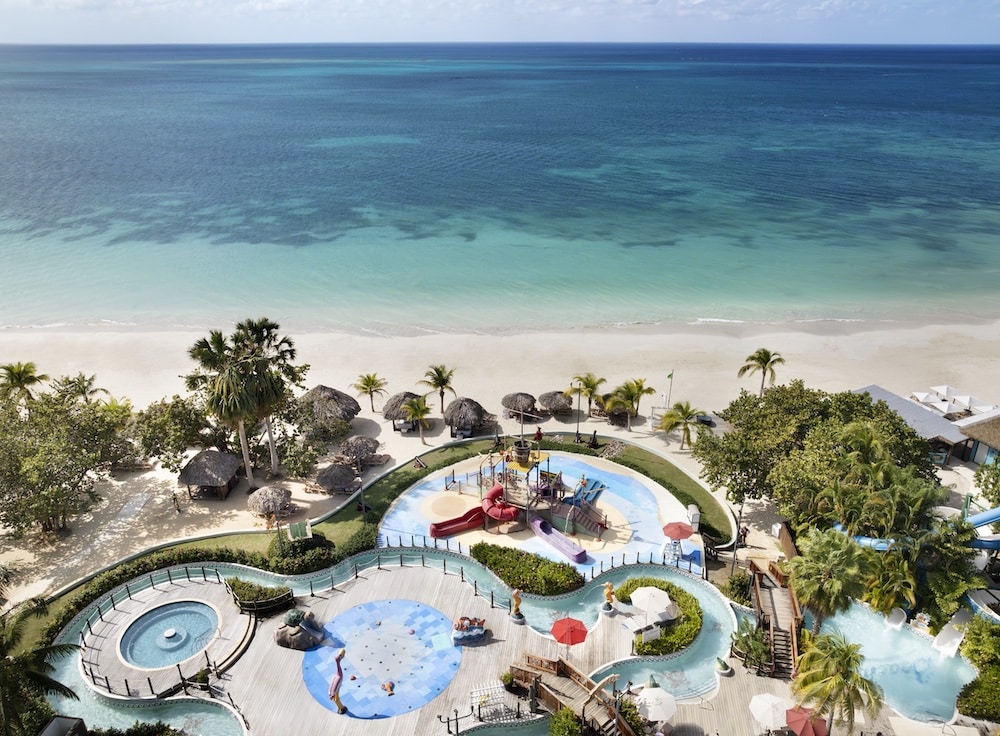 aerial of resort with blue water