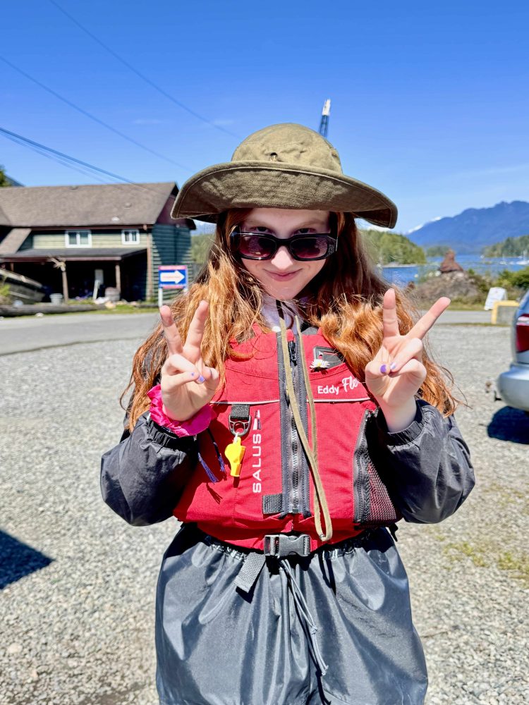 Girl about to go sea kayaking in BC 