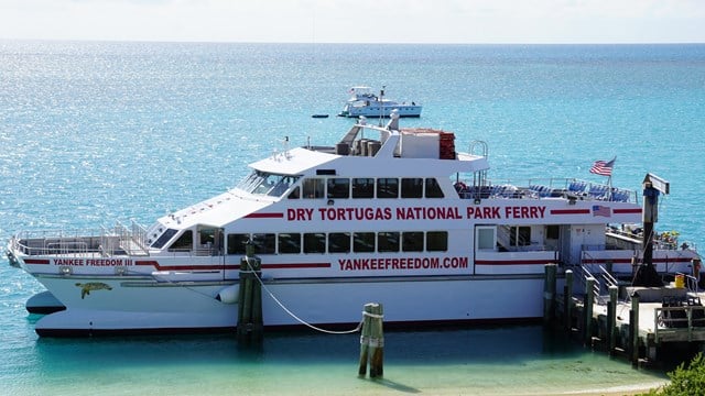 Dry Tortugas Ferry boat docked and sitting in the water. 