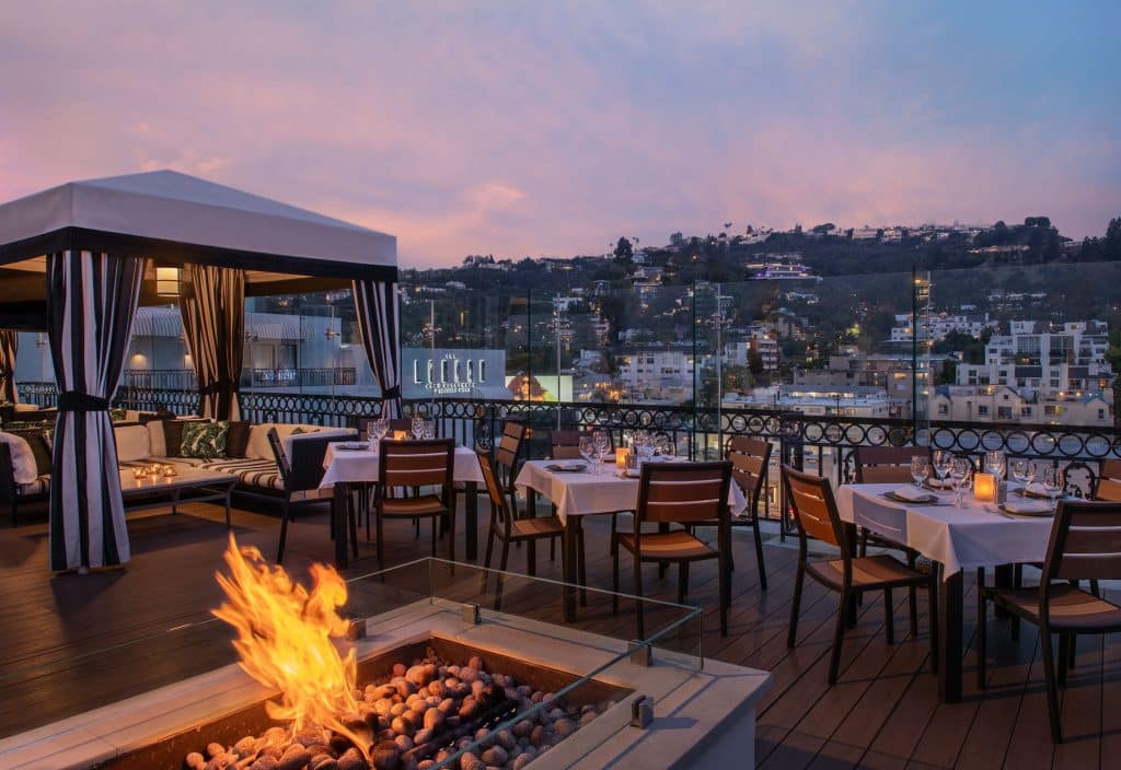fire pit on roof top restaurant overlooking Hollywood