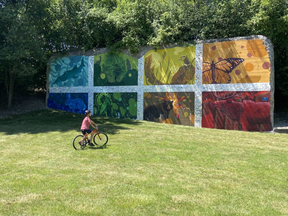 Michael checking out the graffiti art on the Riverwalk.