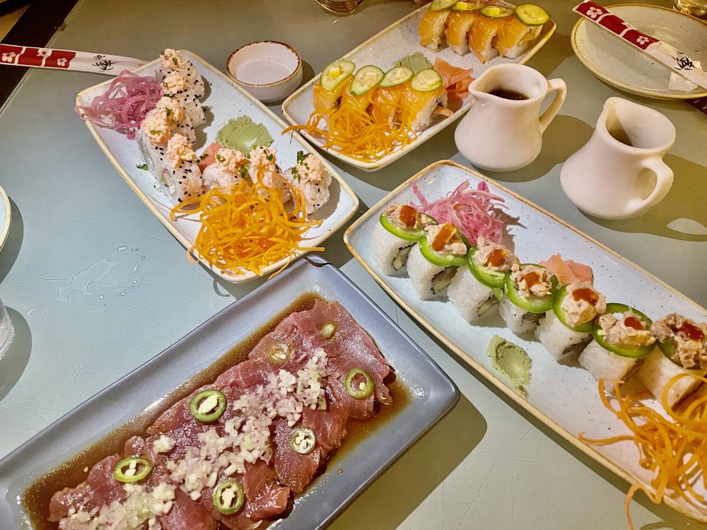 platters of sushi and sashimi