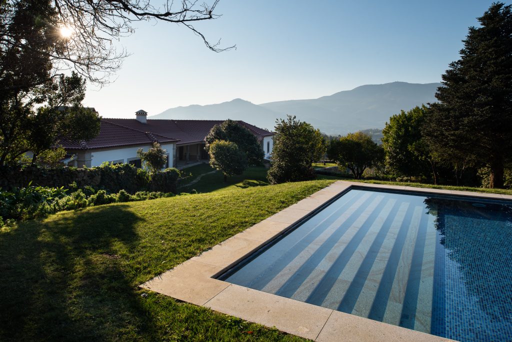 pool, mountains, and a resort